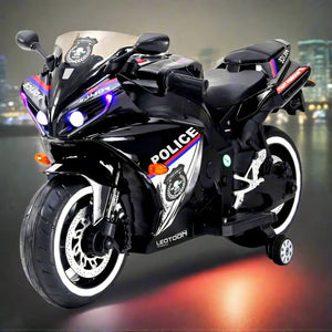 Black and white 12V Police Bike electric ride-on motorcycle for kids, featuring LED lights, police decals, and training wheels. A thrilling battery-operated toy for children from usmile.toys. www.usmile.toys