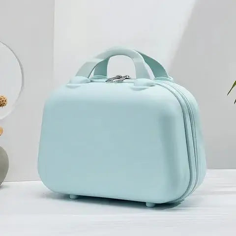Durable light blue kids cosmetic travel case with top handle, perfect for organizing makeup and toiletries on trips. www.usmile.toys
