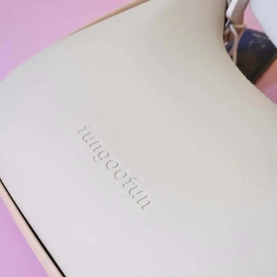 Product with 'fugoo' branding on a light pink background
