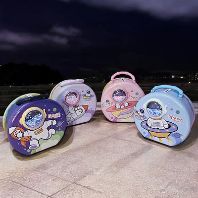 Space-Themed Metal Money Box with Lock & Key – Cute Astronaut & UFO Design Piggy Bank for Kids | Secure & Durable Savings Box with Transparent Coin Window | Ideal Return Gift for Birthdays, Parties & Special Occasions | Fun & Educational Gift for Children to Learn Money-Saving Habits | Available in Multiple Colors | Shop Now at www.usmile.toys