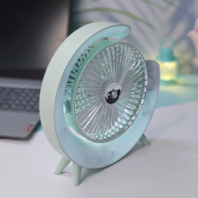 "Stylish and functional: a Usmile Toys moon-shaped portable desk fan with LED, ideal for adding both cool air and ambient light to any workspace or bedside table." www.usmile.toys