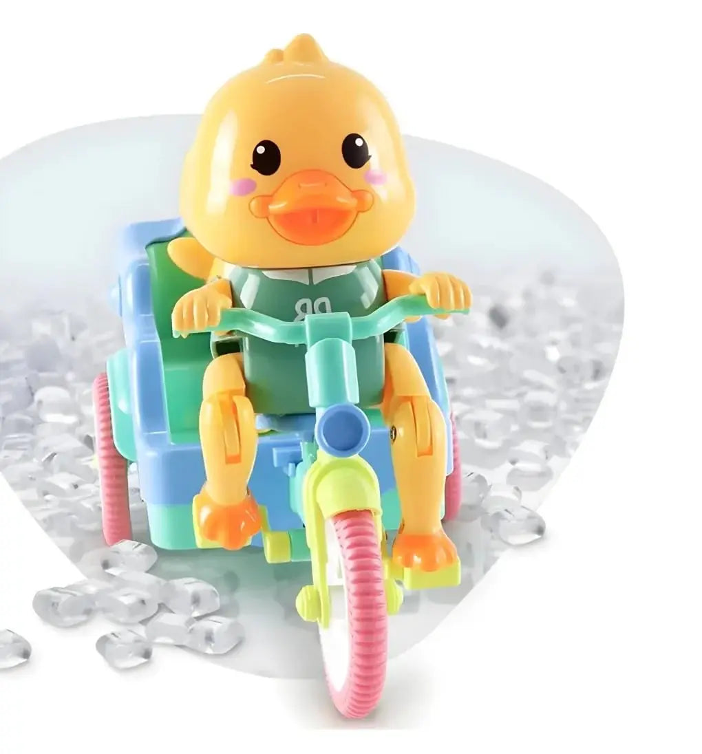 www.usmile.toys "Cute yellow duck toy riding a blue and green tricycle with a smaller duck in the back, features music and motion for infant entertainment."