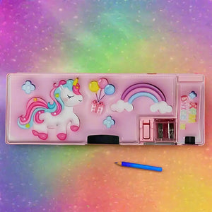 Kids' pink magnetic compass box with pop-out compartments, built-in sharpener, and unicorn, rainbow, balloon graphics. www.usmile.toys