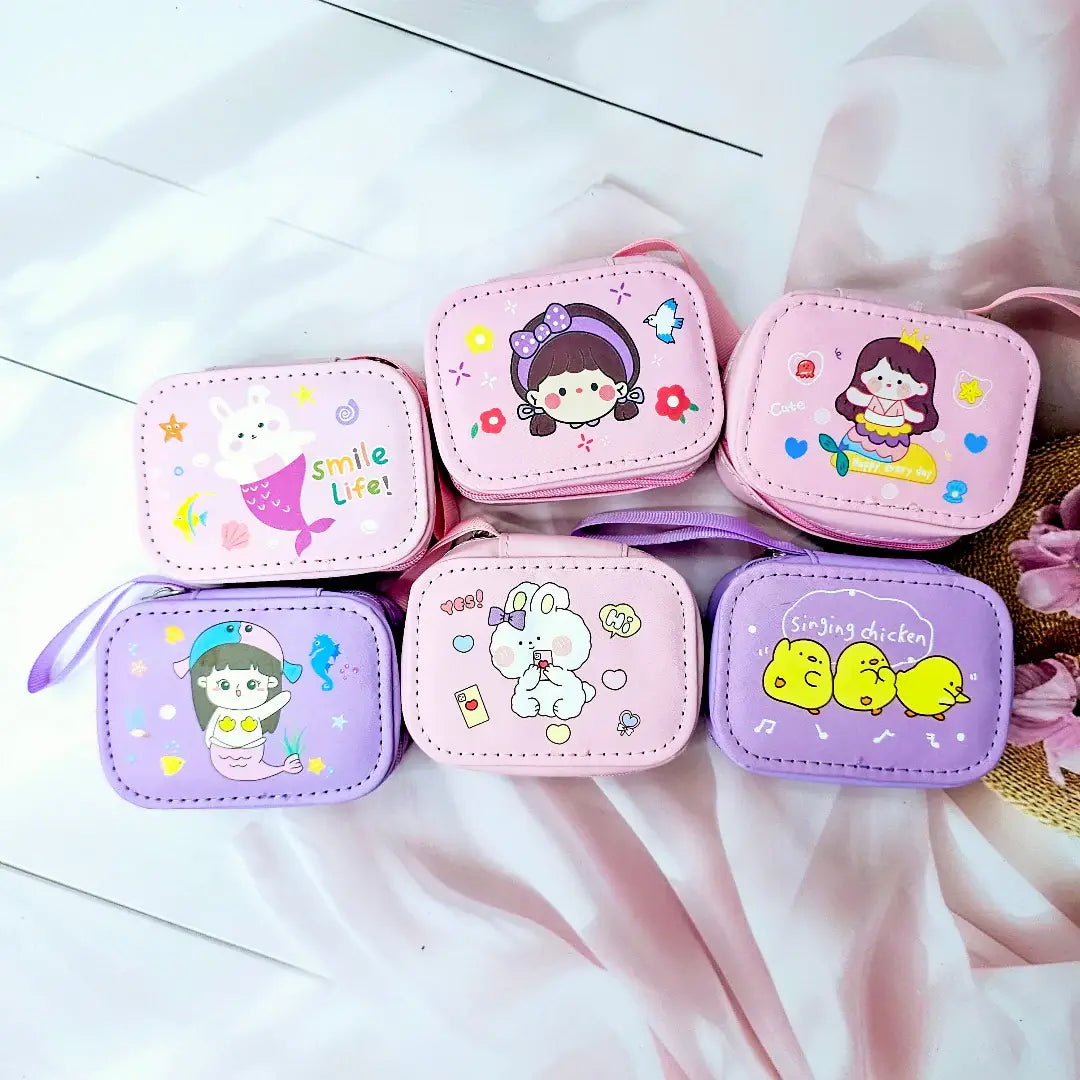 Various cartoon-themed small storage pouches for kids, featuring bunnies, chicks, and other fun designs. www.usmile.toys