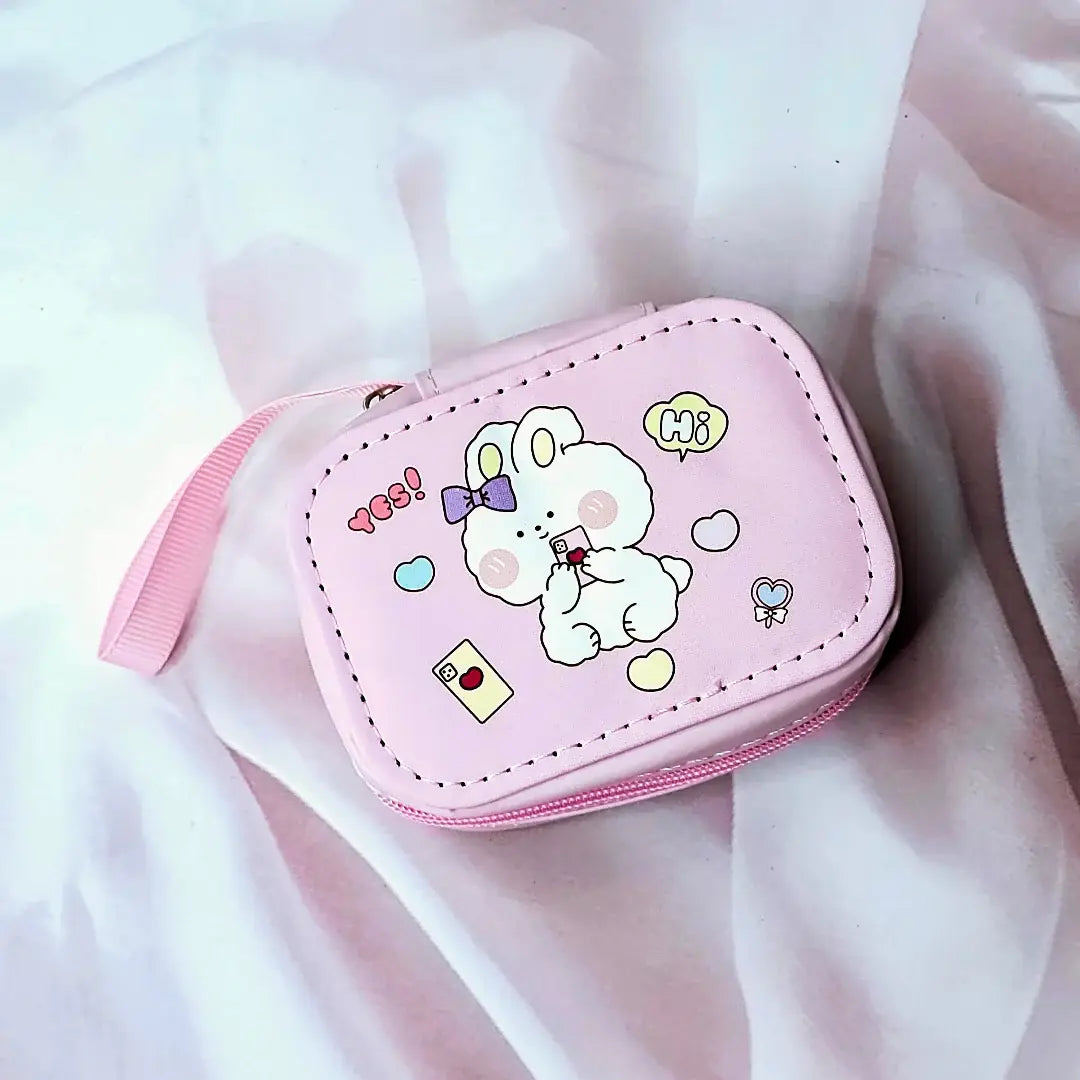 Various cartoon-themed small storage pouches for kids, featuring bunnies, chicks, and other fun designs. www.usmile.toys