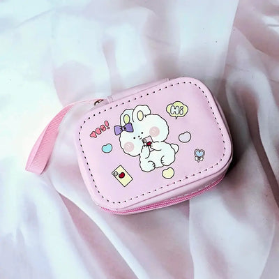 Various cartoon-themed small storage pouches for kids, featuring bunnies, chicks, and other fun designs. www.usmile.toys
