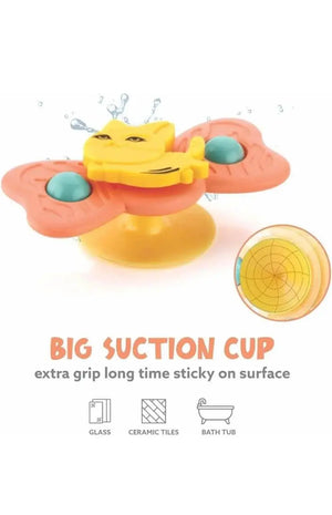 Colorful suction cup toy with text on a white background