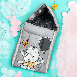 Green 7 in 1 newborn baby bedding set with elephant print, including sleeping bag, mattress, bolsters, pillow, and blankets. www.usmile.com