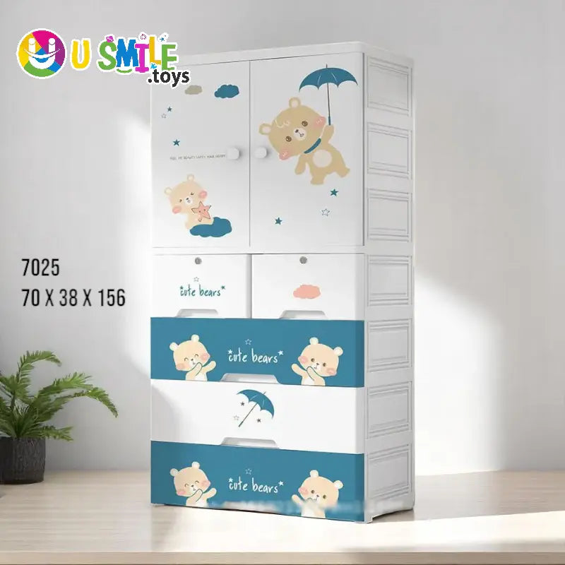 White and blue plastic kids almari (70x38x156 CM) from U Smile Toys, featuring cute bear characters with umbrellas and clouds www. usmile toys