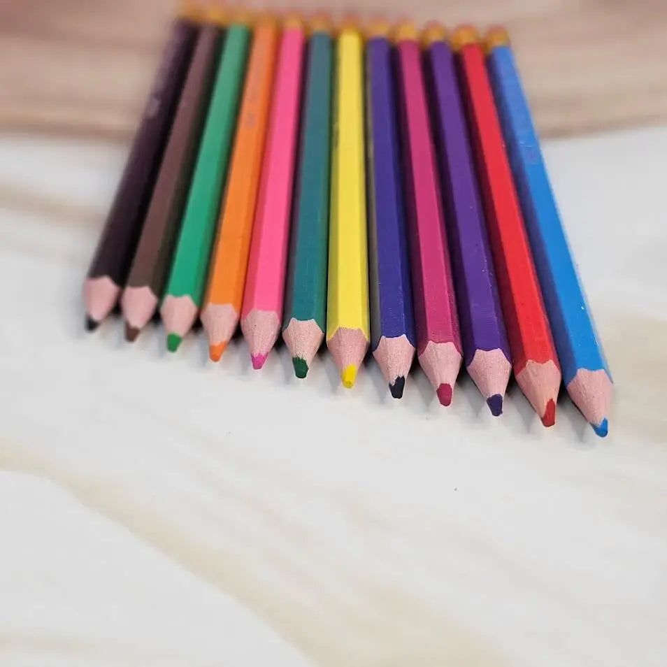 Assortment of 12 bright, kid-friendly pencil colors in a convenient tube packaging, promoting artistic fun and learning for kids, available at uSmile.toys www.usmile.com