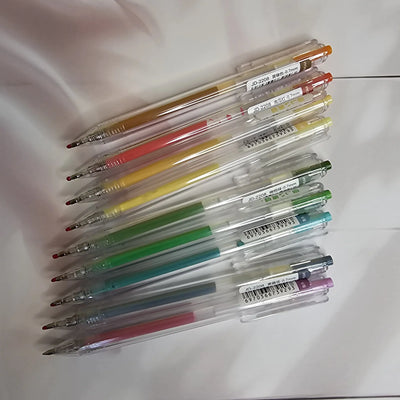Set of 9 Assorted Color Gel Pens: Includes a variety of vibrant and muted ink colors for creative projects. Smooth flow pens.
