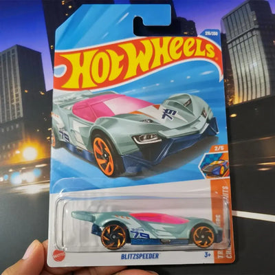Hot Wheels toy car in packaging with cityscape background