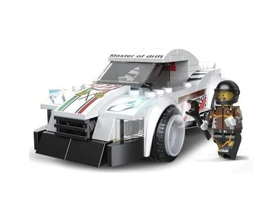 White and black "Multificence" racing car model building blocks set (181 pieces, Ages 6+), forming a sports car with a driver minifigure. Ideal learning kit for kids and aspiring builders from usmile.toys. www.usmile.toys