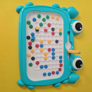 Toy with colorful beads on a yellow background