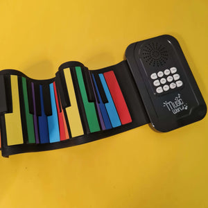 Image showing a 25-key silicone foldable hand roll piano, an electronic music toy perfect for children's learning and portable entertainment from U Smile Toys." www.usmile.toys