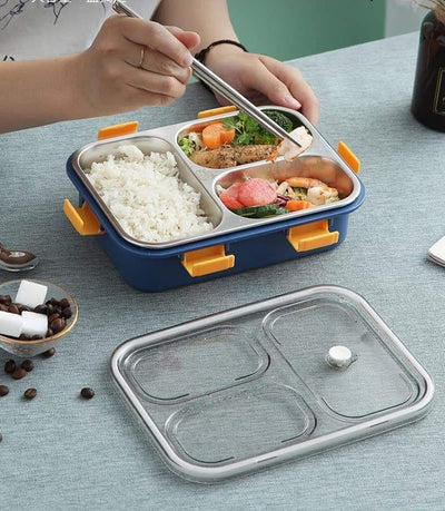 Premium quality stainless steel lunch boxes with colorful airtight lids featuring white, black, and yellow clasps, perfect for kids and adults, displayed neatly alongside healthy meals including rice, fried snacks, fresh fruits, and soup. These stylish and durable lunch containers are ideal for school, office, and travel use. Available at www.usmile.toys, your trusted online store for toys, kids stationery, return gifts, baby products, and essentials. Enhance your lunchtime experience with our leakproof, mu