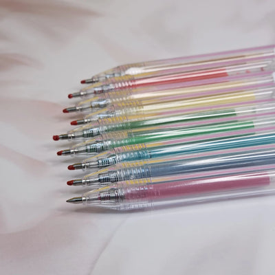 Set of 9 Assorted Color Gel Pens: Includes a variety of vibrant and muted ink colors for creative projects. Smooth flow pens.
www.usmile.toys