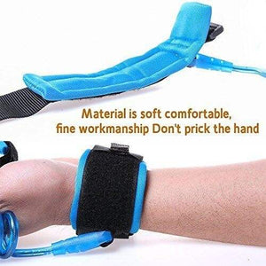 Close-up of a vibrant blue child safety wrist link, showing soft, adjustable cuffs on two wrists and a strong, flexible coiled tether, ideal for preventing children from wandering off, from Usmile Toys. www.usmile.toys