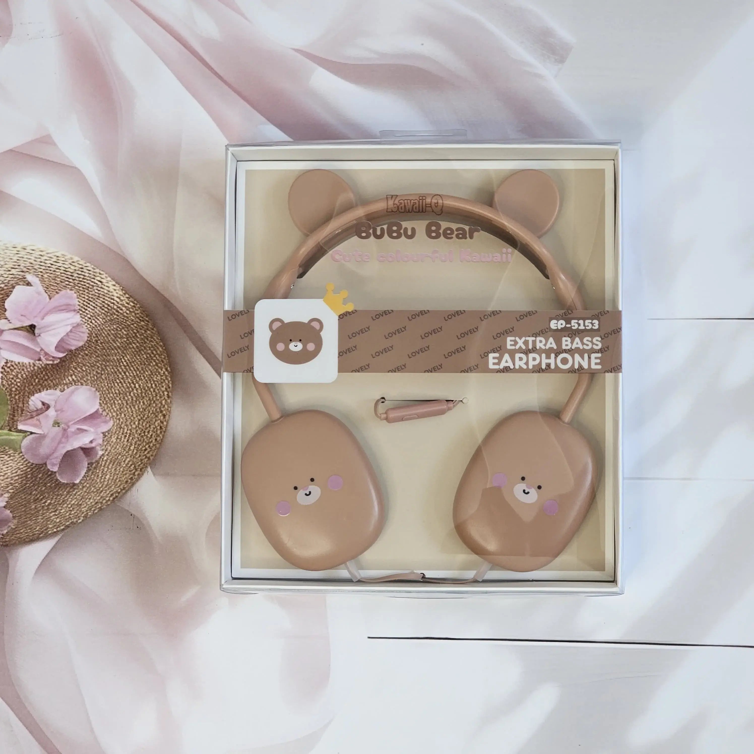 ute Rabbit wired headphones with bear face design on earcups, in a soft pink color, displayed on a white surface.           www.usmile.toys