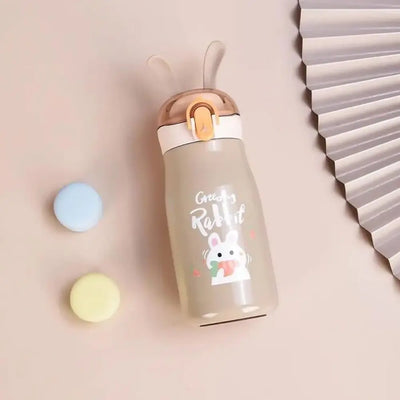 Durable stainless steel thermal flasks for kids with playful bunny ear lids, perfect for school and outdoor activities. www.usmile.toys