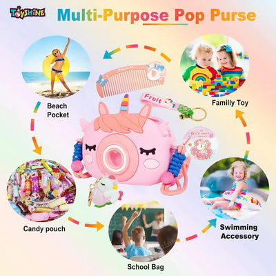 "Usmile Toys Kids' pink camera-shaped silicone bag featuring a unicorn horn and ears, displayed with matching unicorn comb and keychains." www.usmile.toys