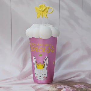 Front view of five Usmile Toys kids' insulated cups, each with a different cartoon design (pug, donut, bunny, giraffe, girl) and a distinctive cloud-like lid with a matching character straw topper." www.usmile.toys