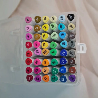 Usmile Toys art supplies: a 48-color marker pen set with bright and anime-inspired colors, featuring a peacock design on the packaging insert."
