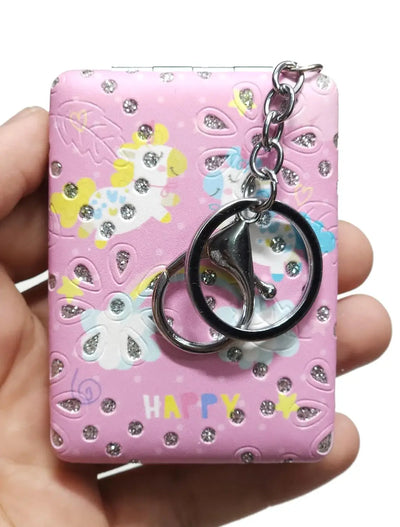 Small square mirror with a colourful unicorn print and a secure keychain, perfect for little girls to carry easily .

www.usmile.toys