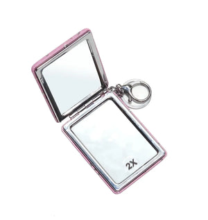 Small square mirror with a colourful unicorn print and a secure keychain, perfect for little girls to carry easily.

www.usmile.toys