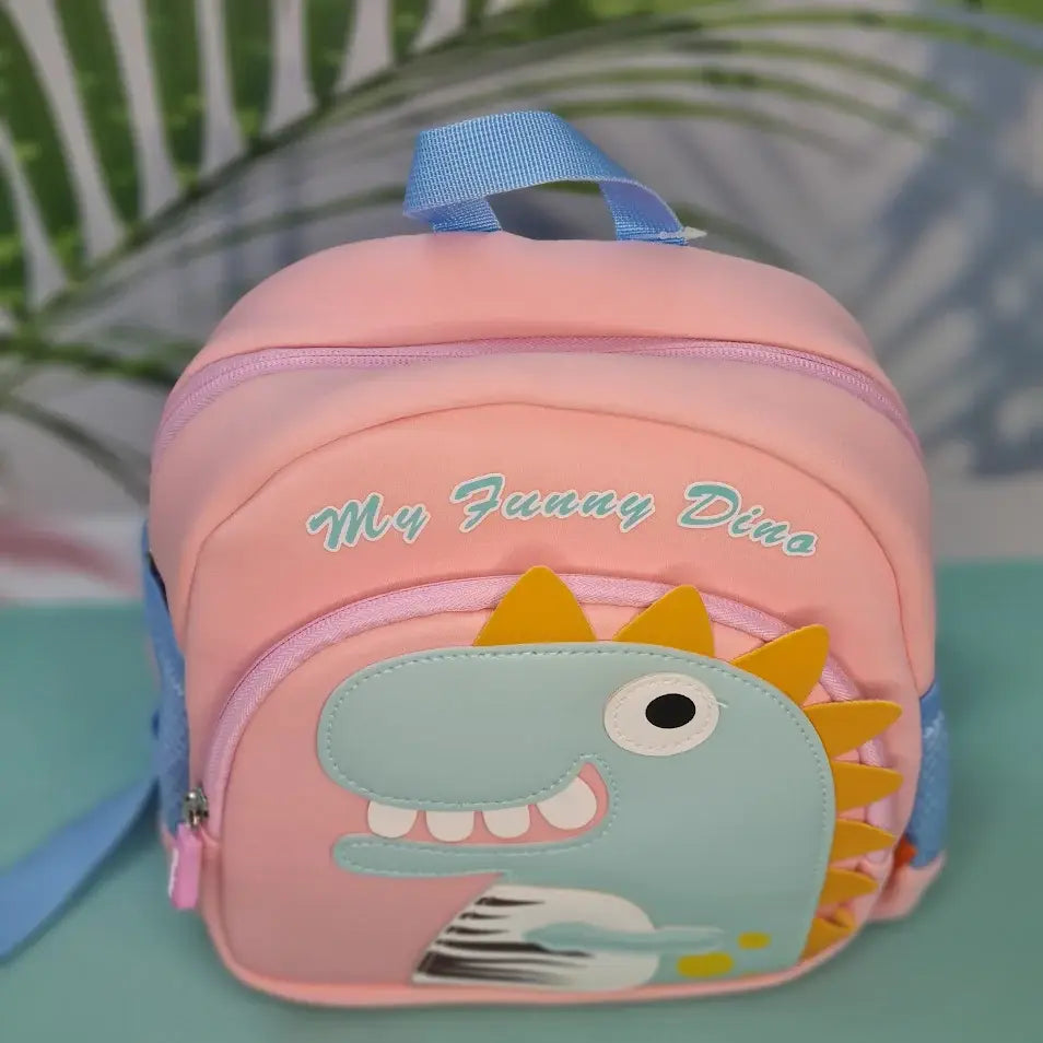 Pink children's backpack with a blue dinosaur applique and the text "My Funny Dino"