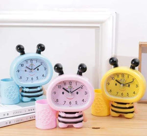 Cute Bee Shaped Alarm Clock: Includes a pen cup for stationery. Fun and practical desk accessory.
www.usmile.toys