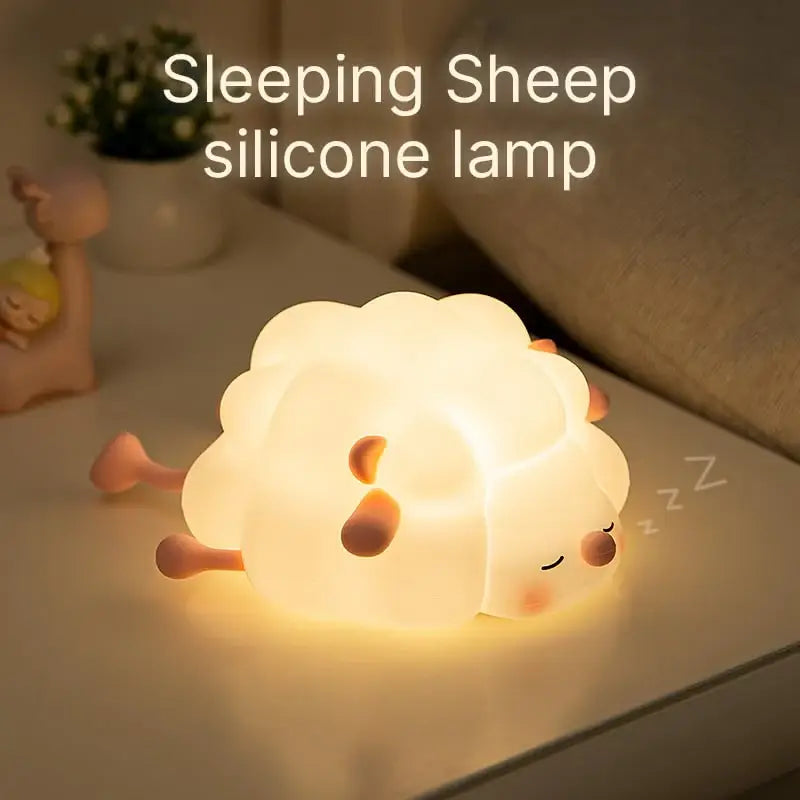 Provide a gentle, comforting glow with this sweet silicone night lamp featuring a cute sleeping sheep design, perfect for kids' rooms and helping them drift off to sleep. Find it at uSmile.toys." www.usmile.toys