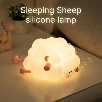 Provide a gentle, comforting glow with this sweet silicone night lamp featuring a cute sleeping sheep design, perfect for kids' rooms and helping them drift off to sleep. Find it at uSmile.toys." www.usmile.toys