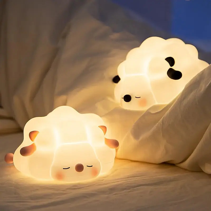 Provide a gentle, comforting glow with this sweet silicone night lamp featuring a cute sleeping sheep design, perfect for kids' rooms and helping them drift off to sleep. Find it at uSmile.toys." www.usmile.toys