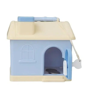 Kids' house money bank with lock, key, and 3D sticker compatibility, in pastel pink and blue. www.usmile.toys