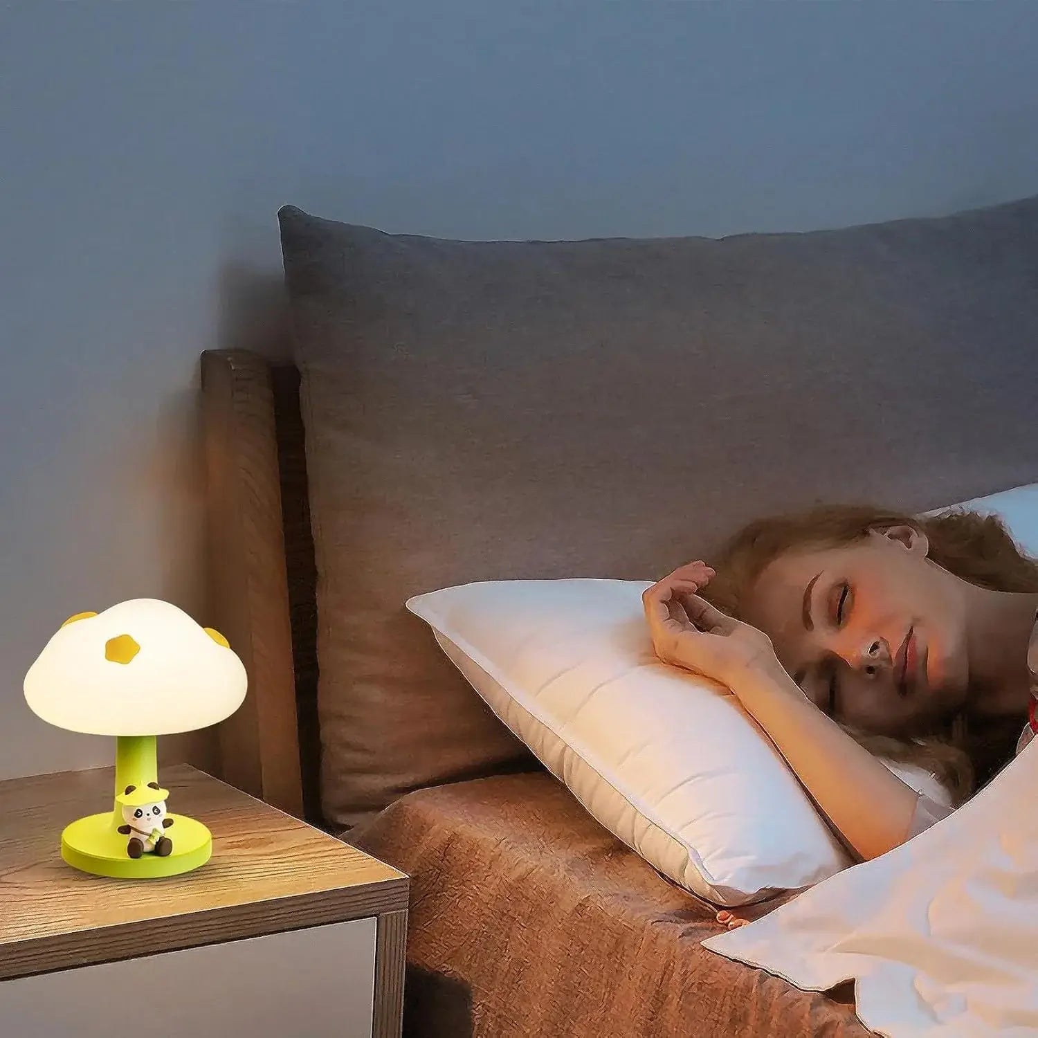 Add a charming and soft glow to any child's bedside with this adorable PoPo Panda silicone table lamp, perfect for bedtime stories and creating a comforting atmosphere. Find it at uSmile.toys." www.usmile.toys
