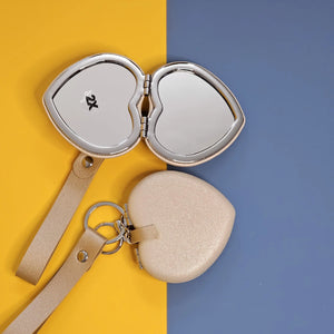 Elegant heart-shaped compact makeup mirror with keychain and strap – perfect for travel Usmile.toys