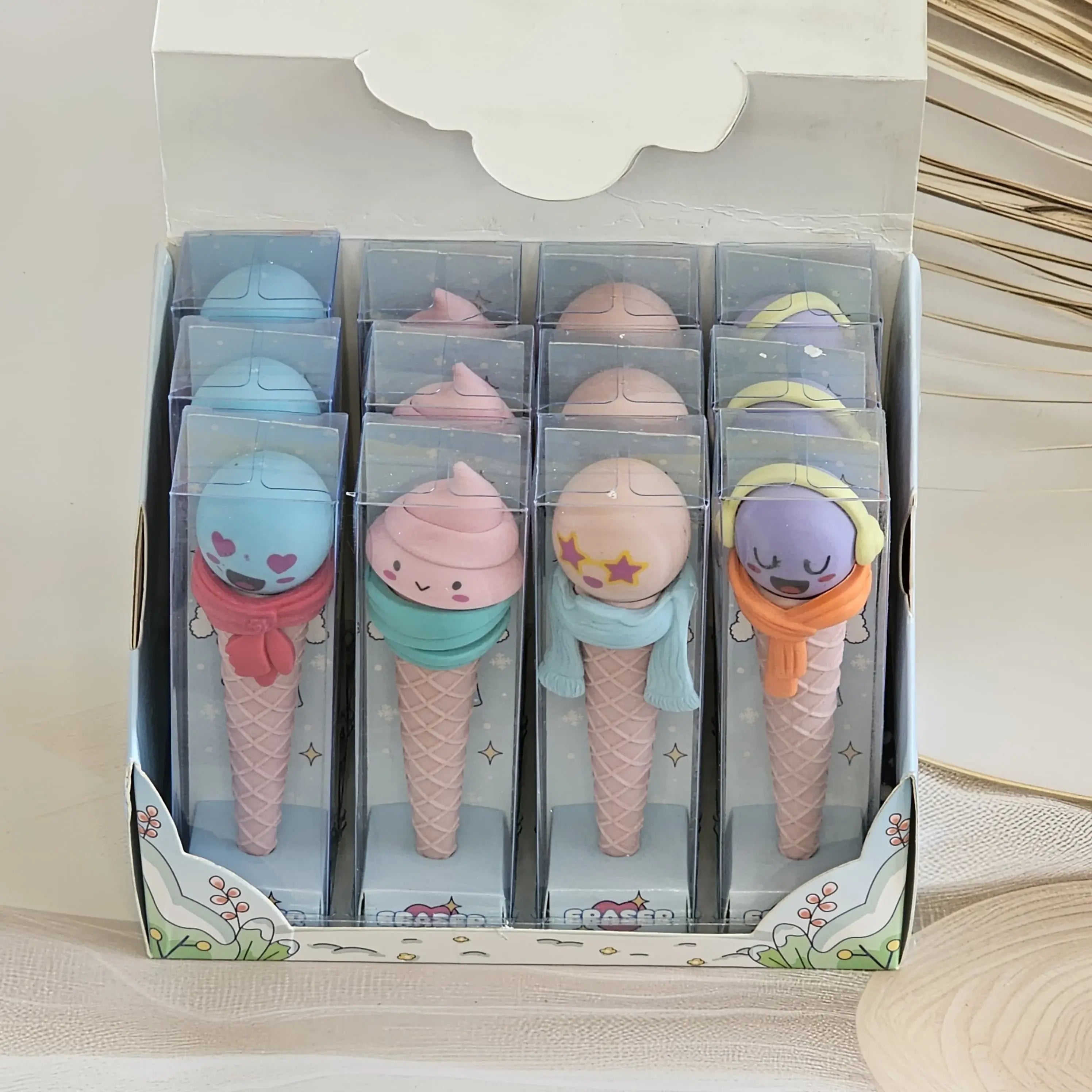Novelty erasers shaped like ice cream cones with cartoon faces, fun and functional for kids, www.usmile.toys.