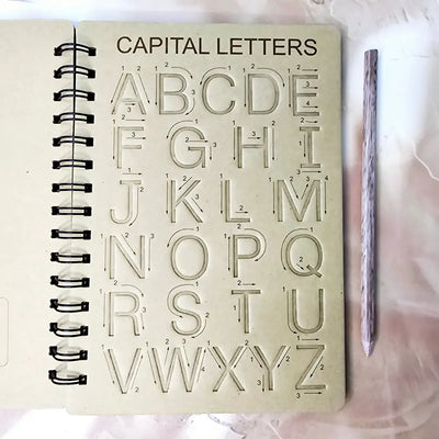 Brown "Learn To Write" tracing board for kids, designed for practicing English alphabet and improving handwriting skills. www.usmile.toys