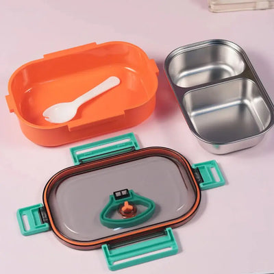 Durable stainless steel lunch box for kids with two separate compartments and a handle, perfect for school lunches. These stylish and durable lunch containers are ideal for school, office, and travel use. Available at www.usmile.toys, your trusted online store for toys, kids stationery, return gifts, baby products, and essentials. Enhance your lunchtime experience with our leakproof, multi-compartment bento boxes designed for easy packing and freshness retention
