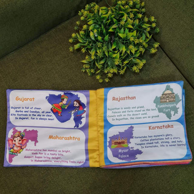  "The Land of Many States" fabric book by Kidogen, showcasing an Indian map, traditional dancers, temples, Ganesha, and a boat, with the brand logo.