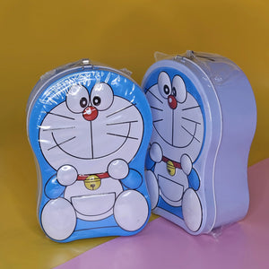 Blue and white Doraemon-shaped metal money box (piggy bank) with a top slot for coins, featuring a lock and key for secure saving. Ideal gift for kids from uSmile.toys." www.usmile.toys