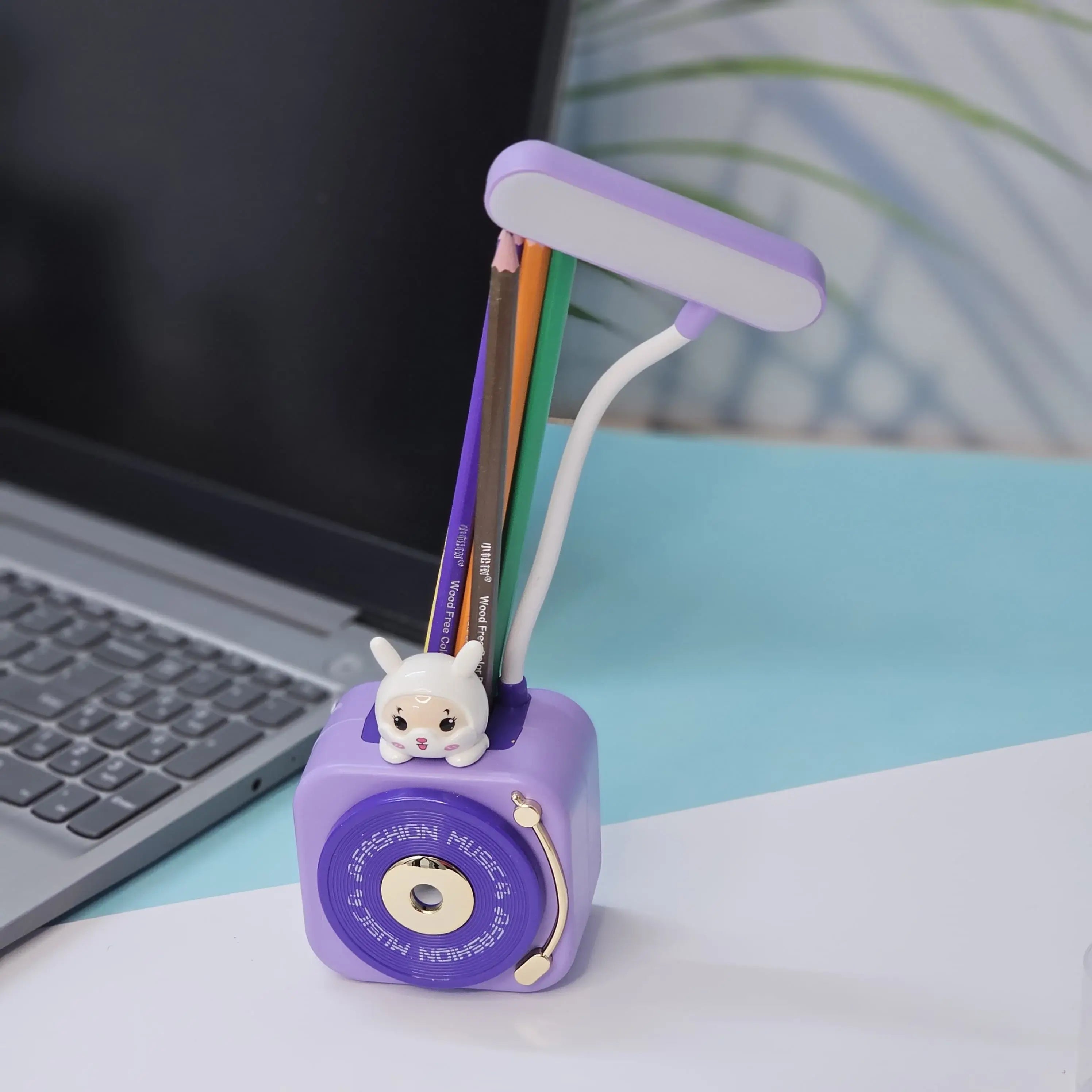 Streamline your child's study space with the Usmile Toys 3-in-1 LED desk lamp. This innovative solution combines a bright reading light with a practical pen holder and pencil sharpener, keeping school supplies neat and accessible for focused learning." www.usmile.toys