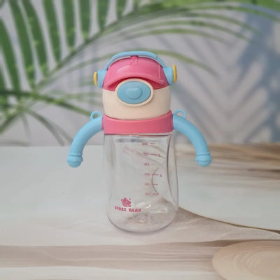 Set of three Space Bear plastic water bottles for kids in blue, red, and pink, each with a straw, handle, and unique bear-themed cap resembling headphones. Ideal sippy cups for toddlers and school children on usmile.toys. www.usmile.toys