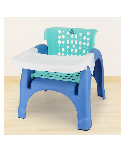 Children's plastic chair with a blue frame and teal seat on a light wooden floor.