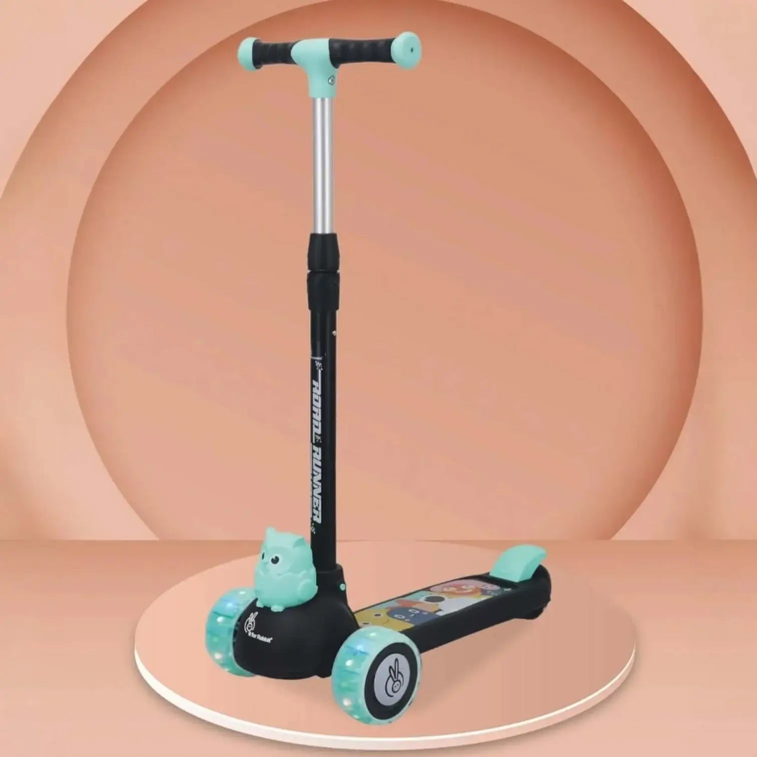 Children's scooter with teal handlebar and wheels on a peach-colored background