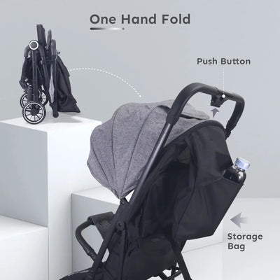 Stroller with one-hand fold feature and push button on a gray background