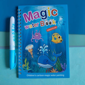 Children's magic water book with underwater illustrations and a marker on a blue background