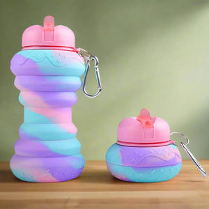 Cute donut-shaped silicone sipper bottle for toddlers and young children, a fun and safe way to stay hydrated . www.usmile.toys  
