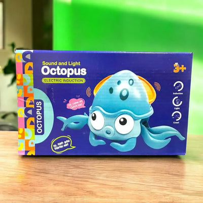 "Blue box for a Usmile Toys Sound and Light Octopus electric induction toy, featuring a cute blue octopus with a light-up head and phrases like 'Hi, come on! Catch me!'" www.usmile.toys